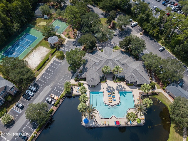 birds eye view of property with a water view