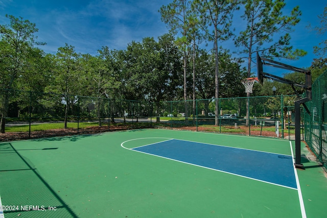 view of sport court with community basketball court and fence