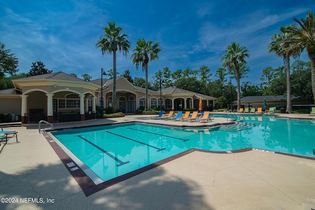 community pool featuring a patio area