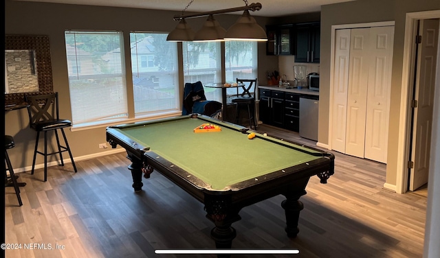 rec room with baseboards, wood finished floors, and pool table