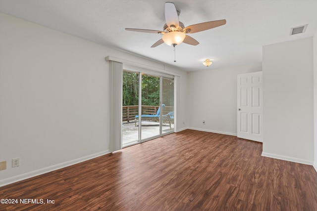 spare room with ceiling fan and hardwood / wood-style floors