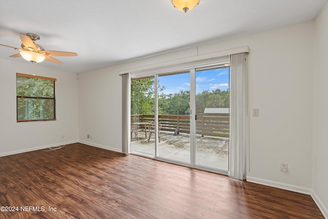 unfurnished room with hardwood / wood-style floors and ceiling fan