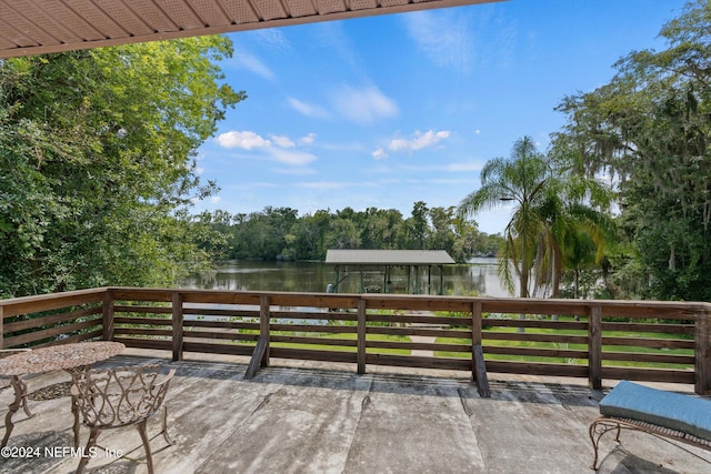 deck featuring a water view