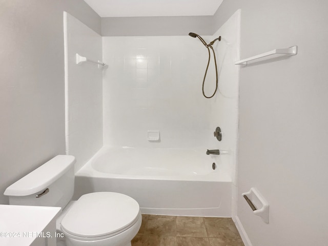 full bathroom with vanity, toilet, tile patterned floors, and tiled shower / bath