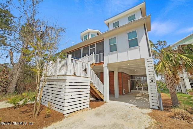 49 SW 279th Ave, Steinhatchee, FL 32359 - beach home with a sunroom and stairs