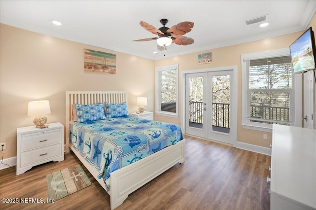 49 SW 279th Ave, Steinhatchee, FL 32359 - bedroom featuring visible vents, crown molding, wood finished floors, and access to outside