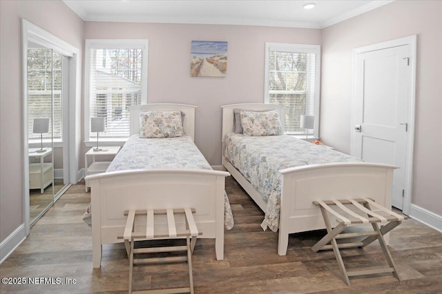 49 SW 279th Ave, Steinhatchee, FL 32359 - bedroom featuring ornamental molding, wood finished floors, and multiple windows