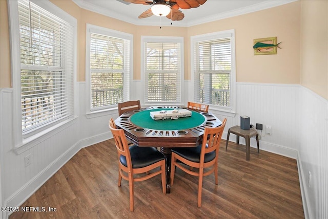 49 SW 279th Ave, Steinhatchee, FL 32359 - dining space with wainscoting, wood finished floors, ornamental molding, and a ceiling fan