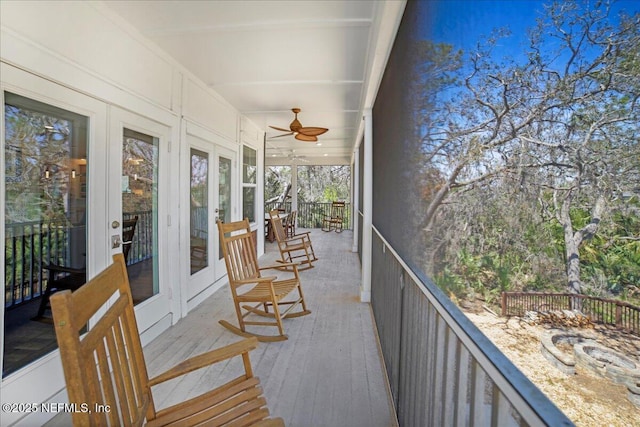 49 SW 279th Ave, Steinhatchee, FL 32359 - sunroom with french doors and a ceiling fan
