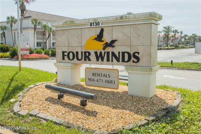 view of community sign