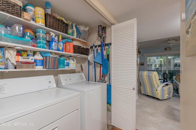 washroom featuring washing machine and clothes dryer