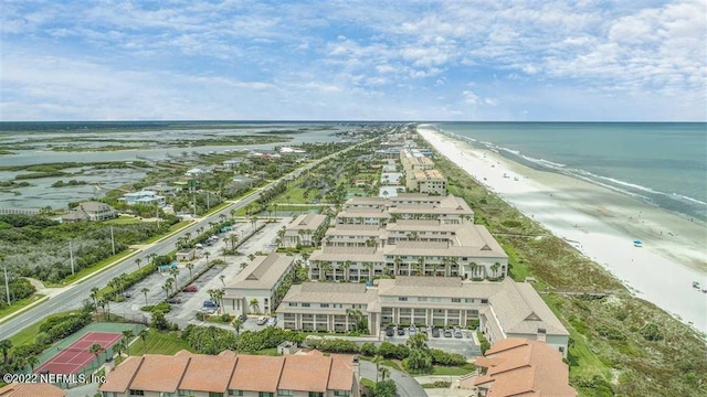 aerial view featuring a view of the beach and a water view