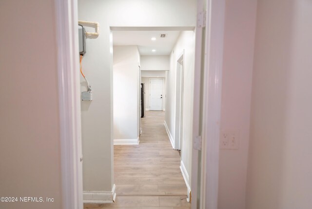 corridor featuring light wood-type flooring