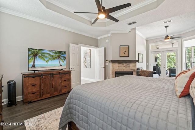 bedroom with dark wood-style floors, access to outside, french doors, and visible vents