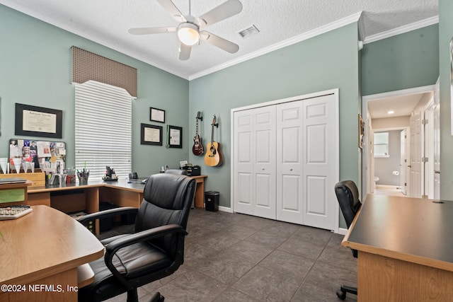 office space featuring visible vents, ornamental molding, a textured ceiling, and a ceiling fan