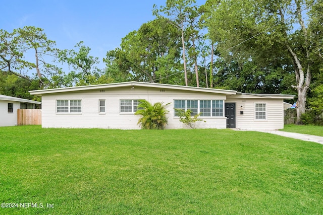 view of front of house with a front lawn