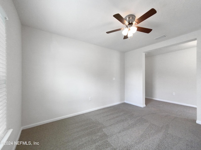 unfurnished room featuring carpet flooring and ceiling fan