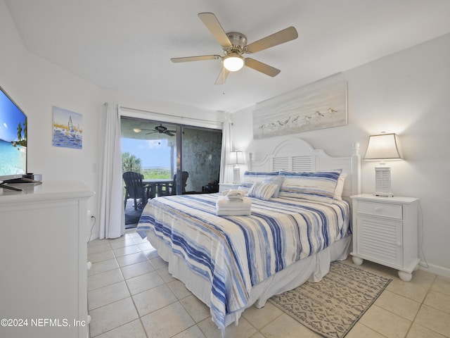 bedroom featuring ceiling fan, light tile patterned flooring, and access to exterior