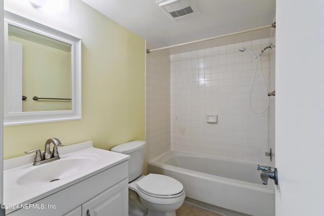 bathroom featuring vanity, toilet, visible vents, and shower / washtub combination