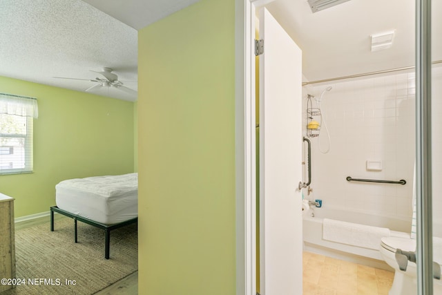 bedroom featuring visible vents, ceiling fan, a textured ceiling, and baseboards