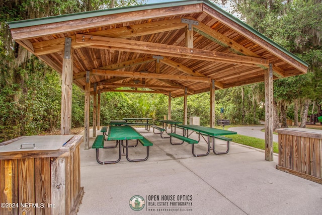 surrounding community with a gazebo and a patio