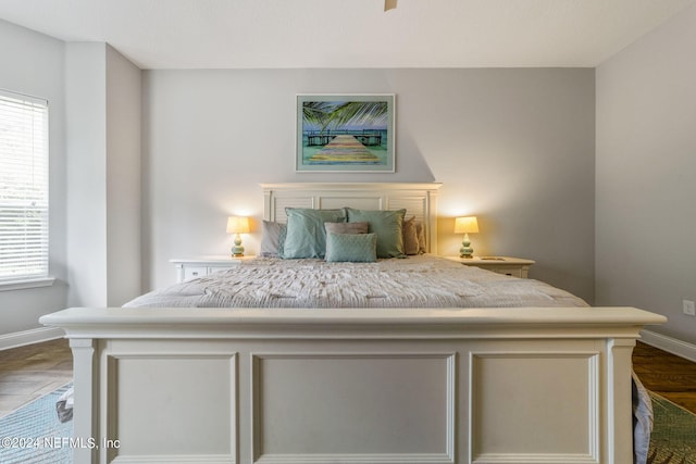 unfurnished bedroom featuring hardwood / wood-style flooring