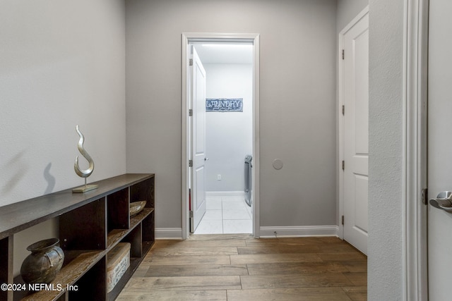 corridor featuring light wood-type flooring