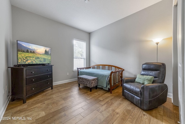 bedroom with light wood-type flooring