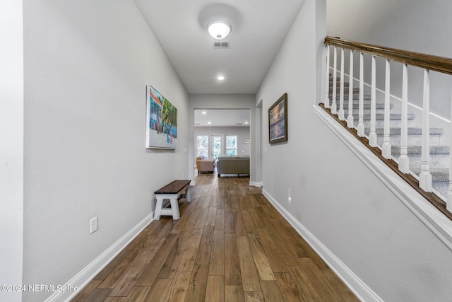 hall featuring wood-type flooring