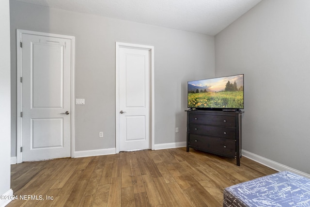 bedroom featuring light hardwood / wood-style flooring