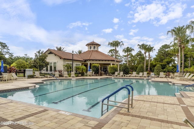 view of swimming pool featuring a patio