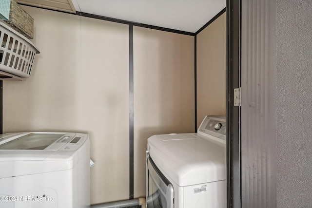 laundry area featuring separate washer and dryer