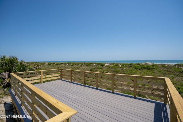 deck featuring a water view