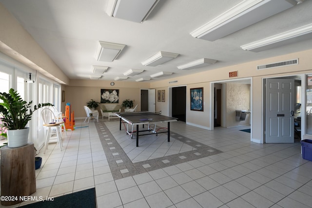 playroom featuring light tile patterned flooring