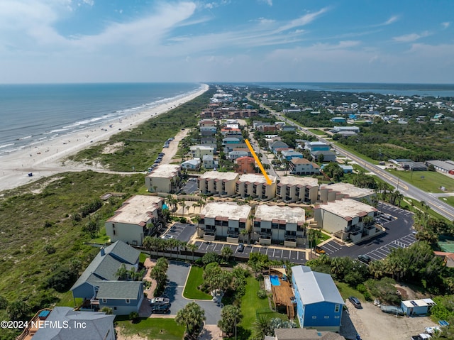 drone / aerial view with a view of the beach and a water view