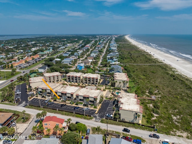 drone / aerial view with a view of the beach and a water view