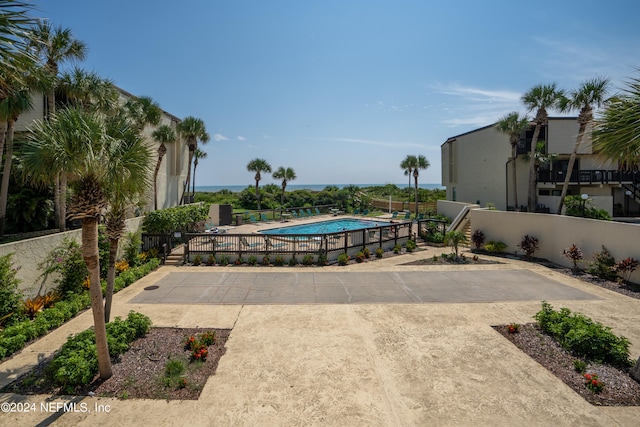 view of swimming pool with a patio area