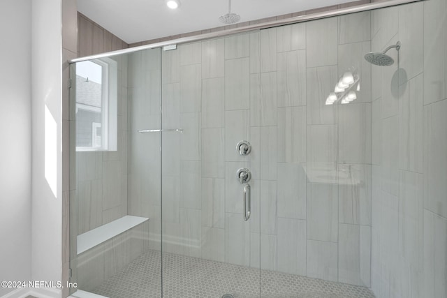 bathroom featuring walk in shower