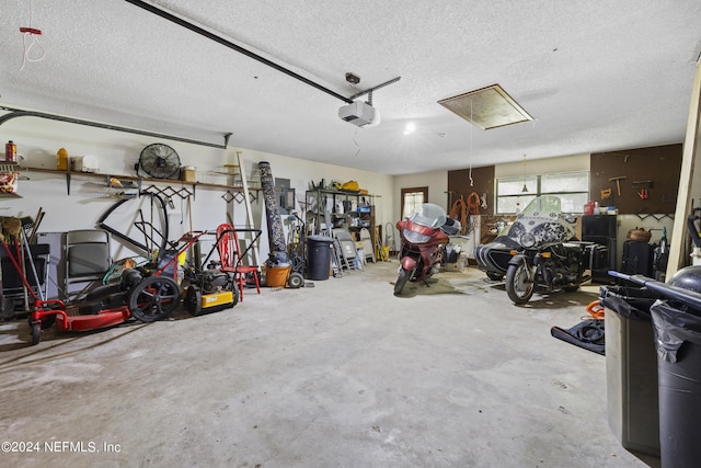 garage featuring a garage door opener