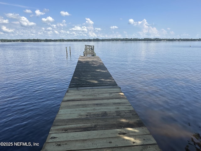 view of dock with a water view