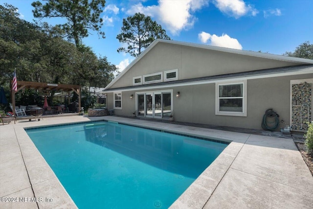 view of pool featuring a pergola and a patio