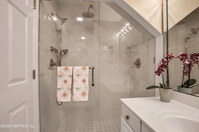 bathroom with vanity and an enclosed shower