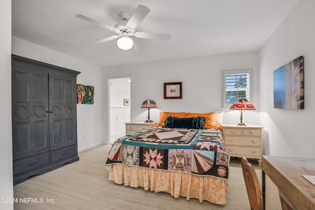 bedroom featuring light carpet and ceiling fan