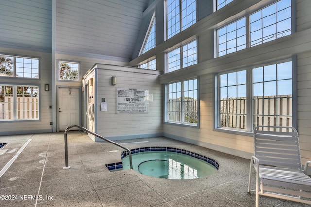 view of pool featuring an indoor hot tub