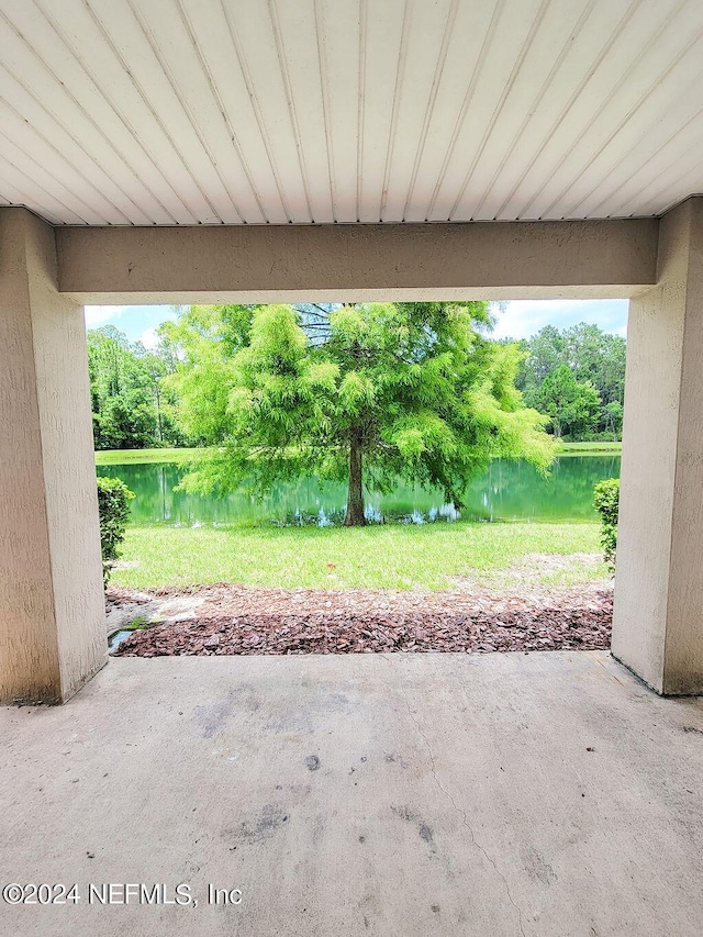 view of patio / terrace featuring a water view