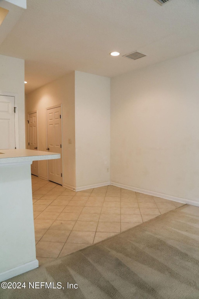 view of tiled spare room