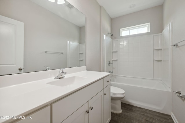 full bathroom with toilet, vanity, and shower / bathing tub combination