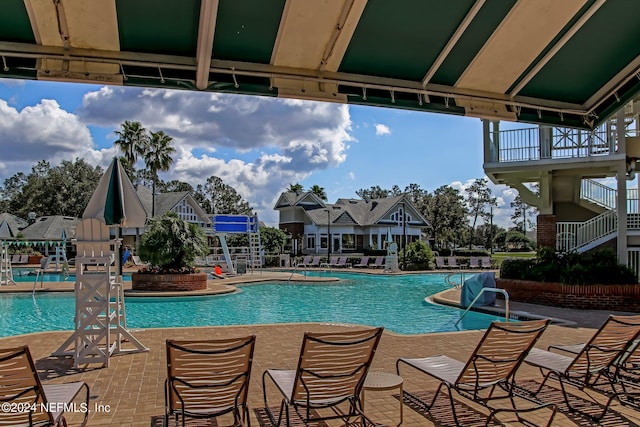 view of pool with a patio area