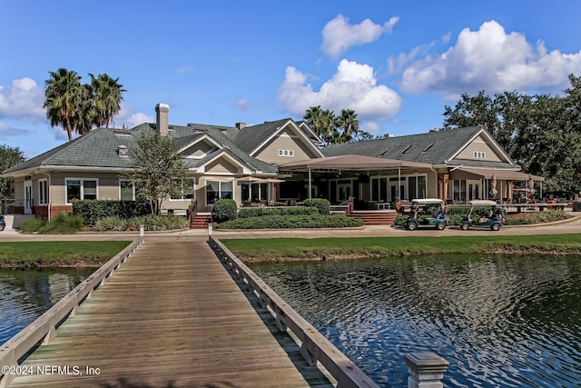 dock area featuring a water view