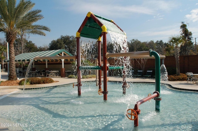 view of swimming pool with a gazebo